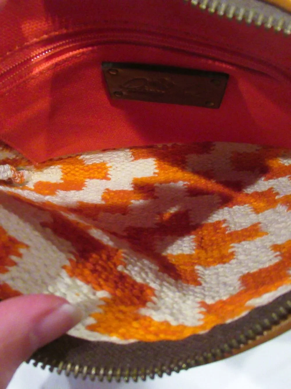 Patricia Nash orange and white wristlet